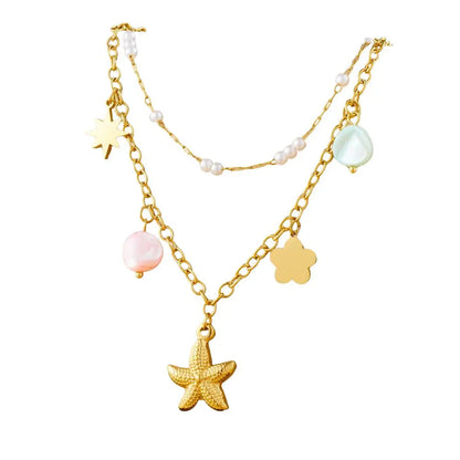 Collier à breloques étoile de mer doré design