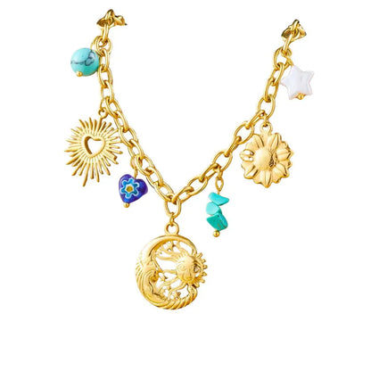 Collier à breloques soleil et lune doré