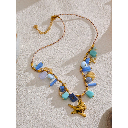 Collier breloques corail bleu et doré