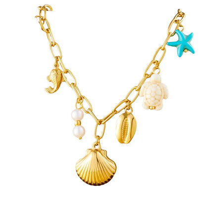 Collier breloques mer et coquillages dorés
