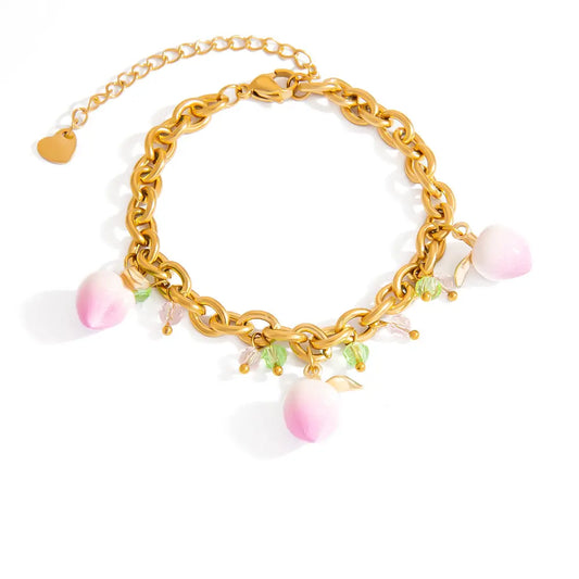Bracelet à breloques pendantes pêches roses