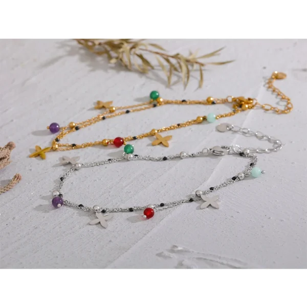 Bracelet à breloques croix argentées et pierres naturelles
