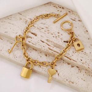 Bracelet breloques avec cadenas doré à bascule