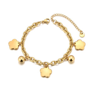 Bracelet à breloques doré avec 3 trèfles et grelots