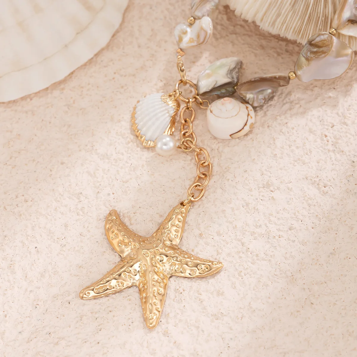 Collier breloque nacre doré tissé, coquillage et étoile de mer – Image 4