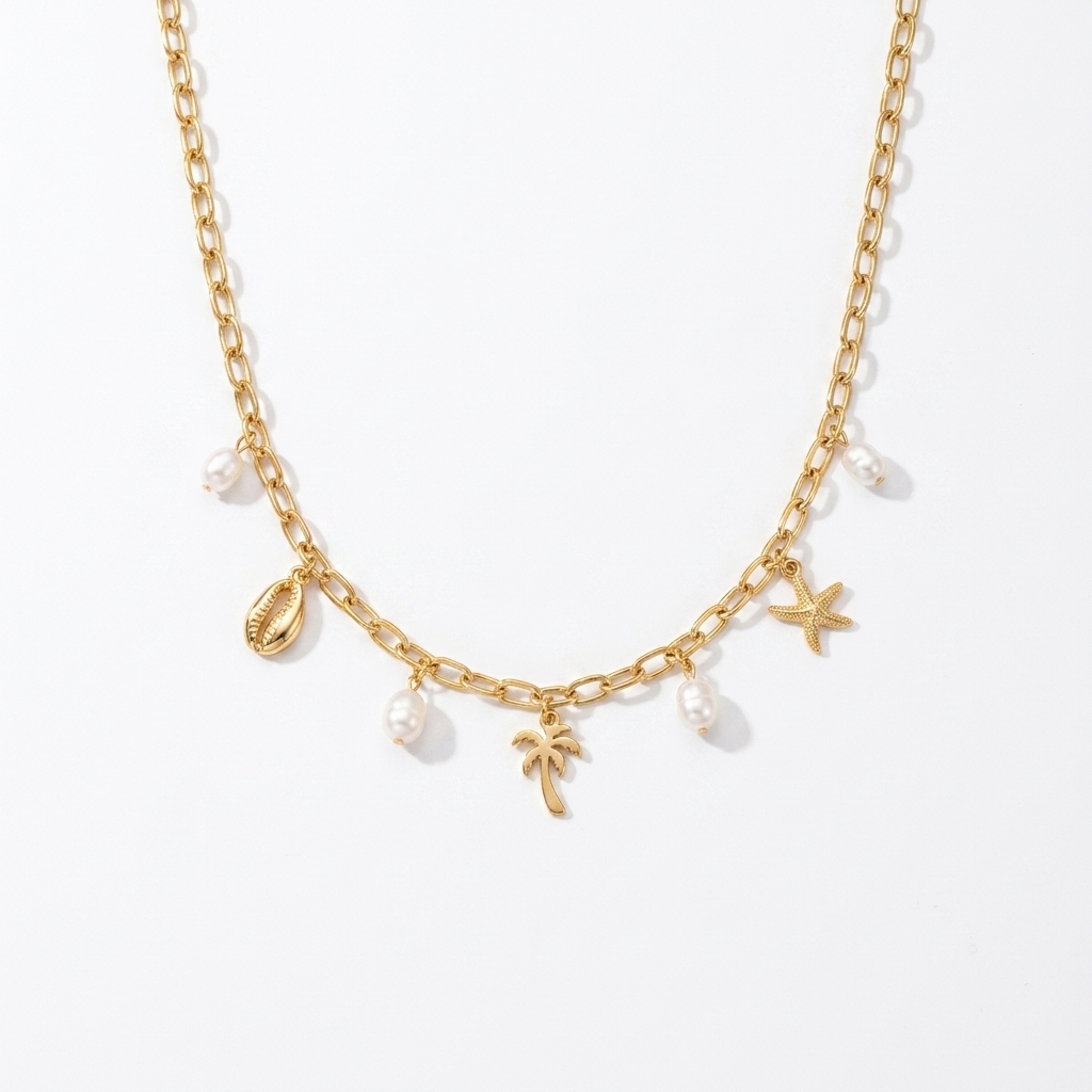 Collier ras-de-cou à doré breloques marines et perle